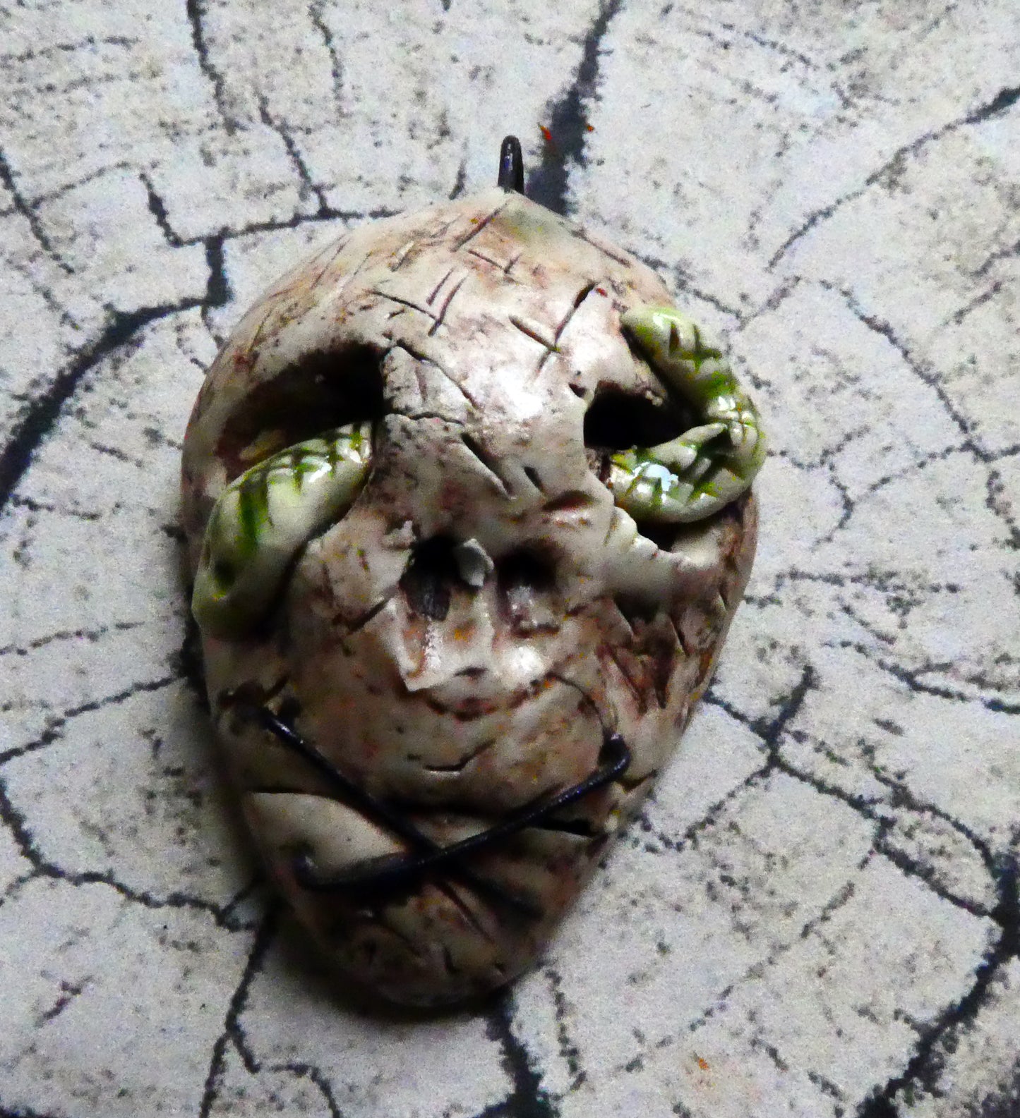 Ceramic Voodoo Stapled Head Pendant #3