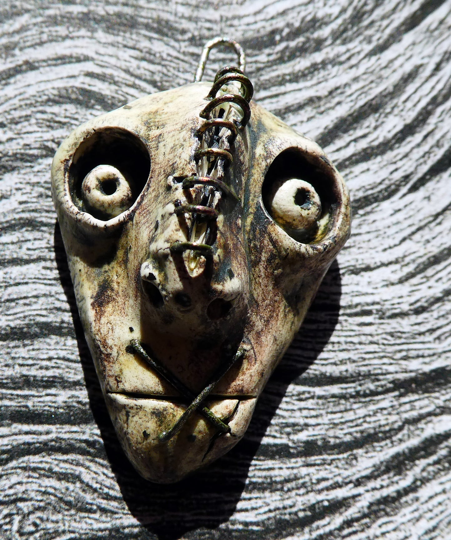 Ceramic Voodoo Stapled Head Pendant #8