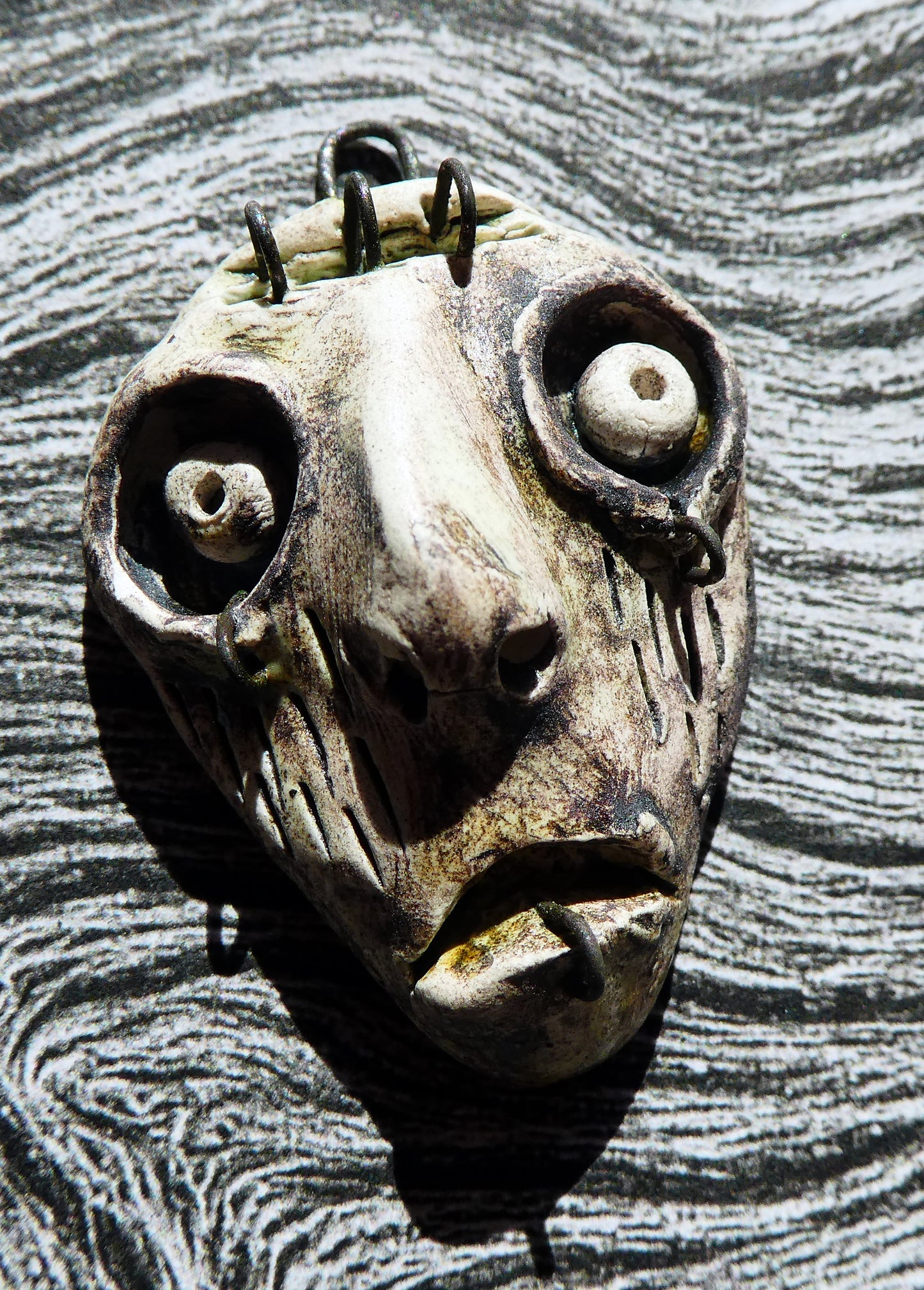 Ceramic Voodoo Stapled Head Pendant #9
