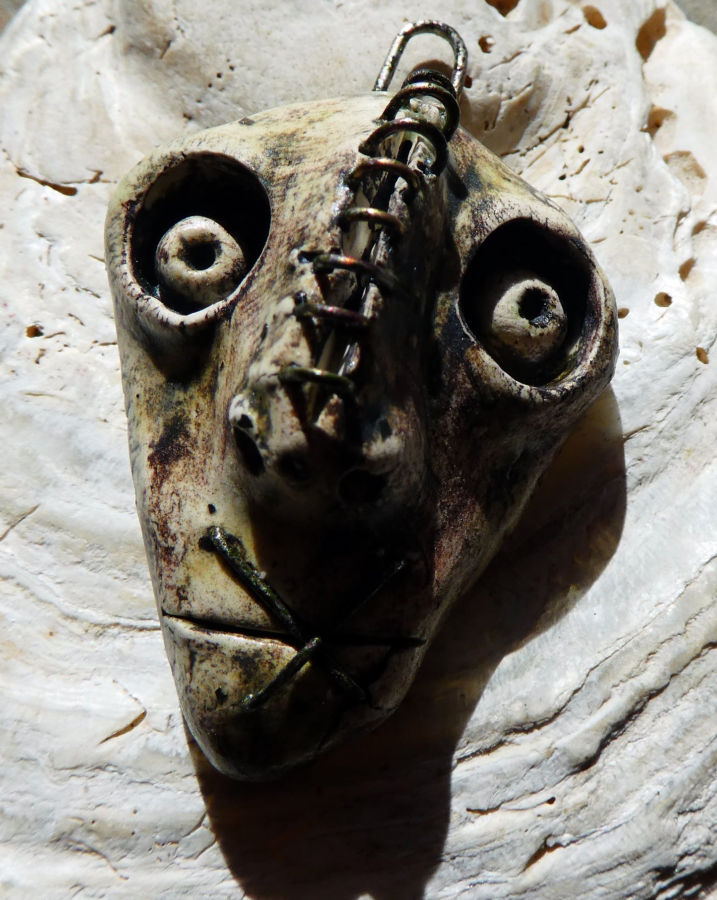 Ceramic Voodoo Stapled Head Pendant #8